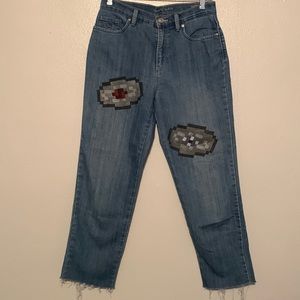 Jeans.distressed at the bottom.